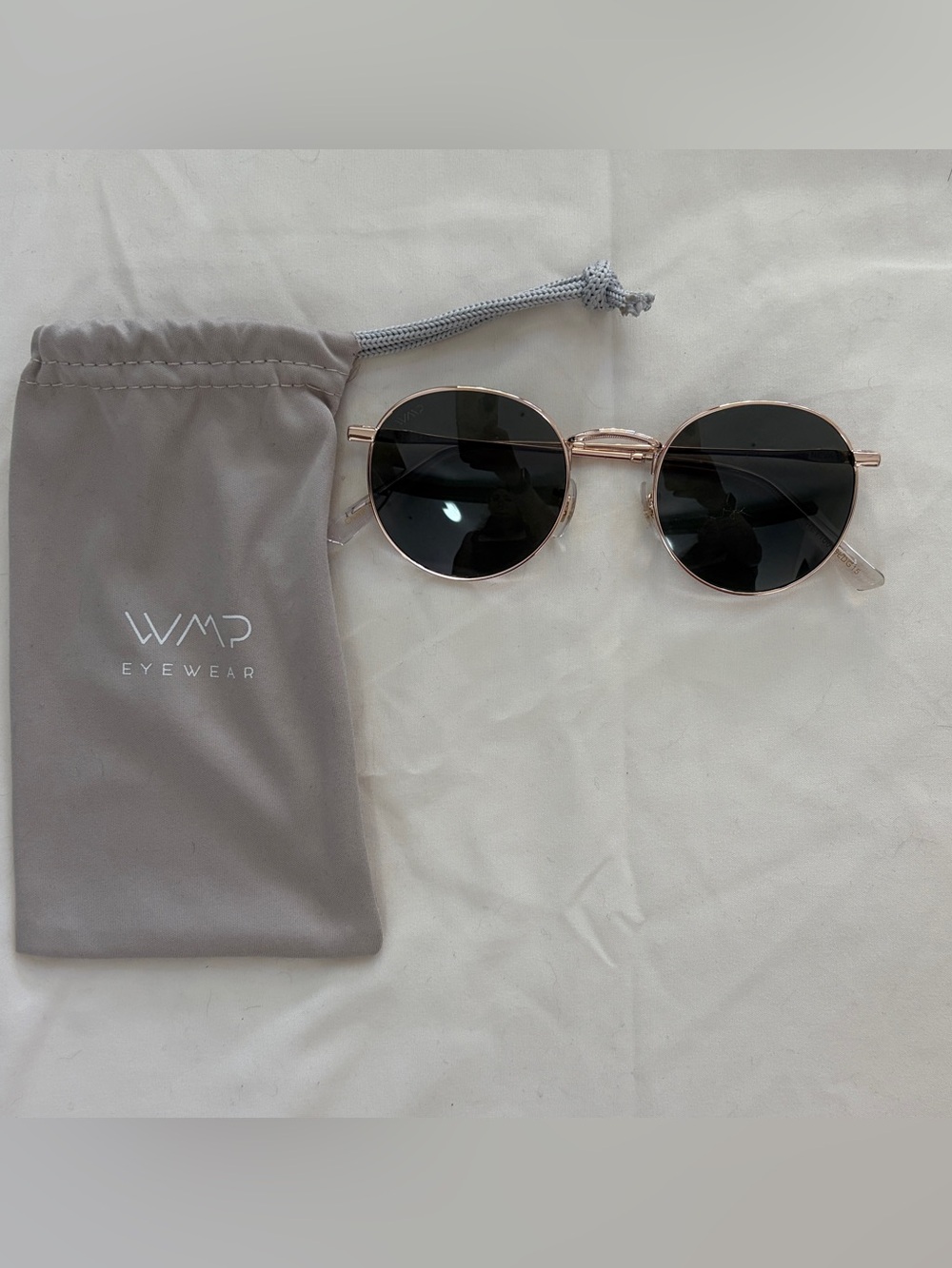 WMP Eyewear Women's Round Metal Sunglasses in Rose Gold with Black Lenses